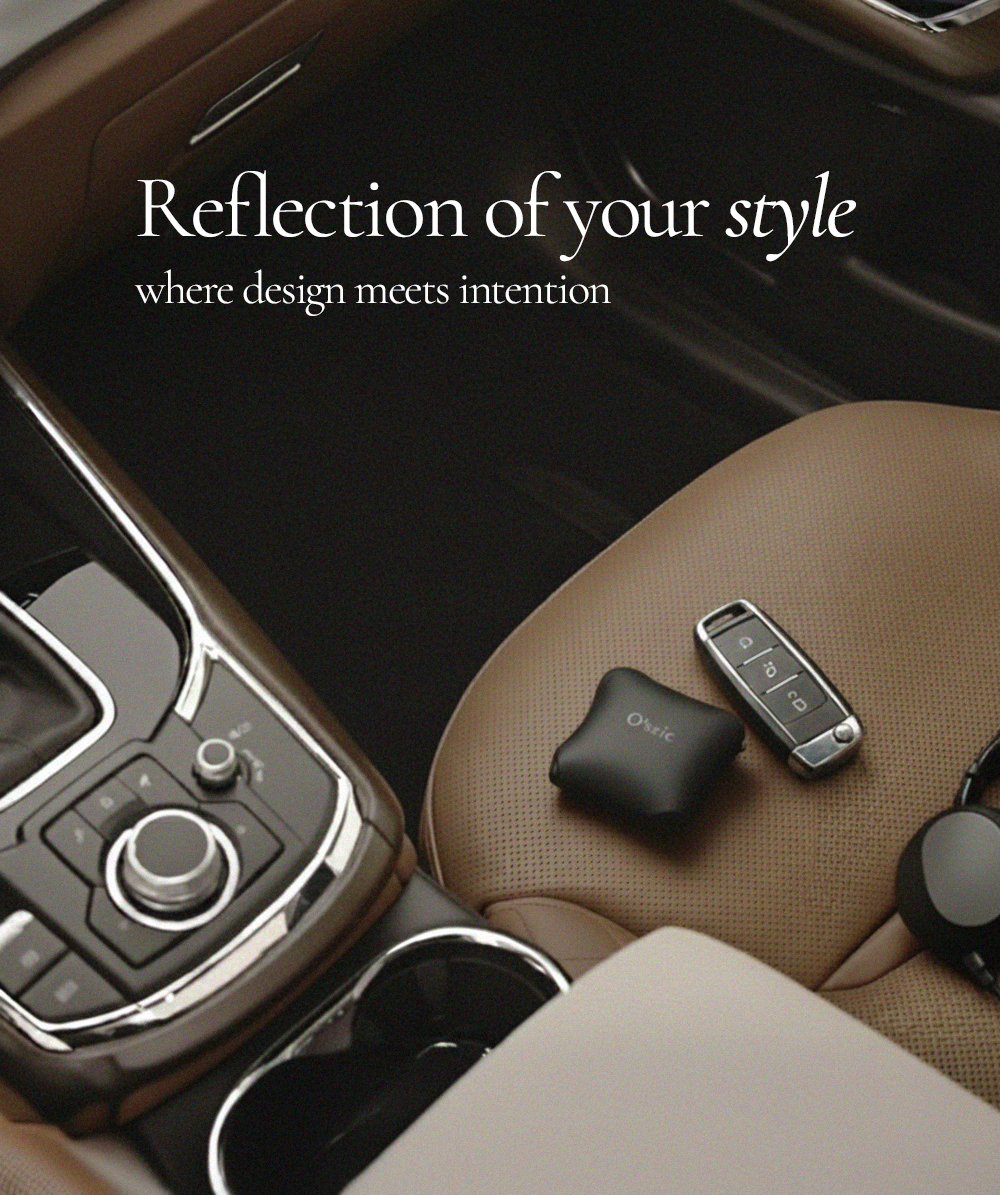 Car interior with black O'sric car diffuser and car key on a brown seat, with text 'Reflection of your style where design meets intention'.